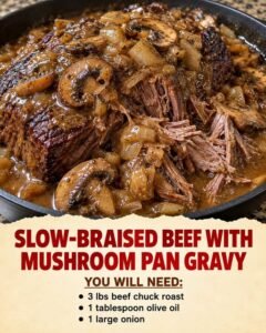 Slow-braised beef chuck roast with tender pulled pieces, sliced mushrooms, onions, and rich brown gravy